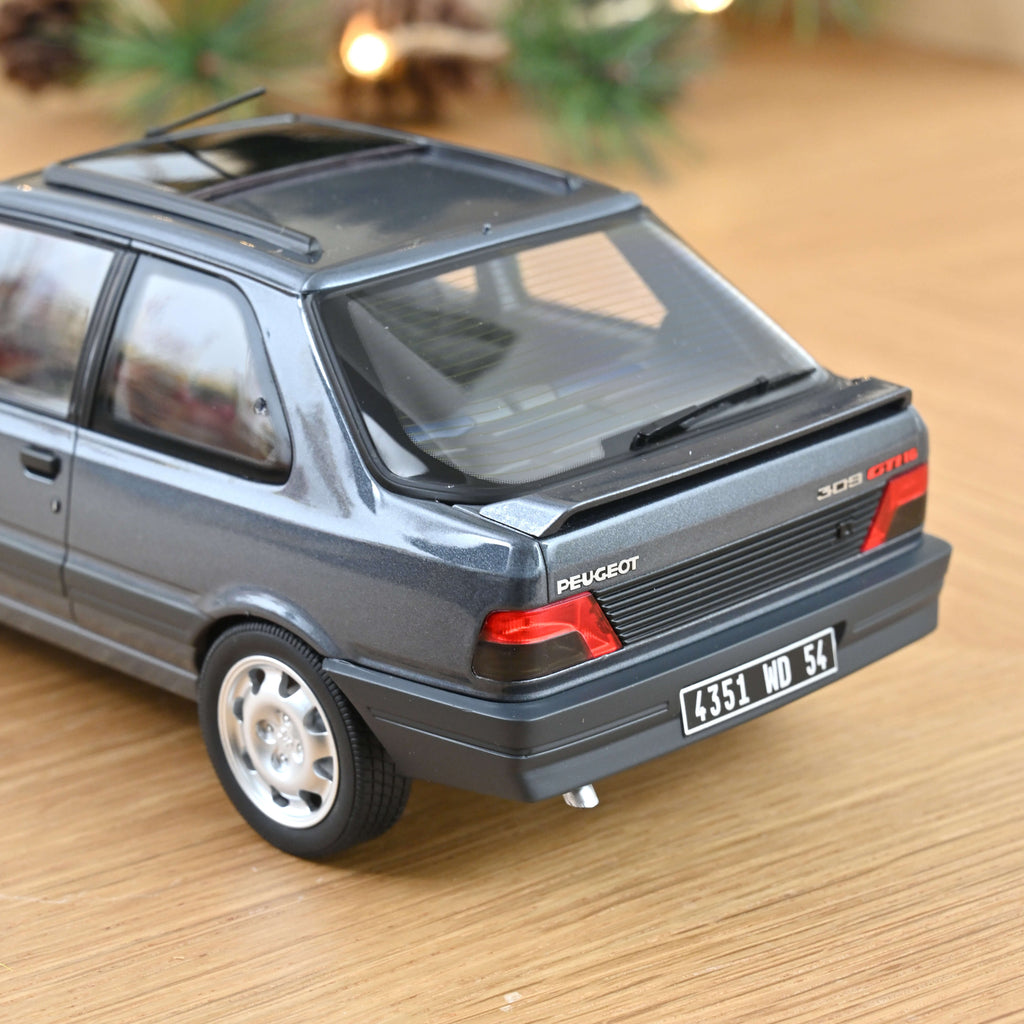 Peugeot 309 GTi 16 1991 Magnum Grey 1:18  - 300pcs