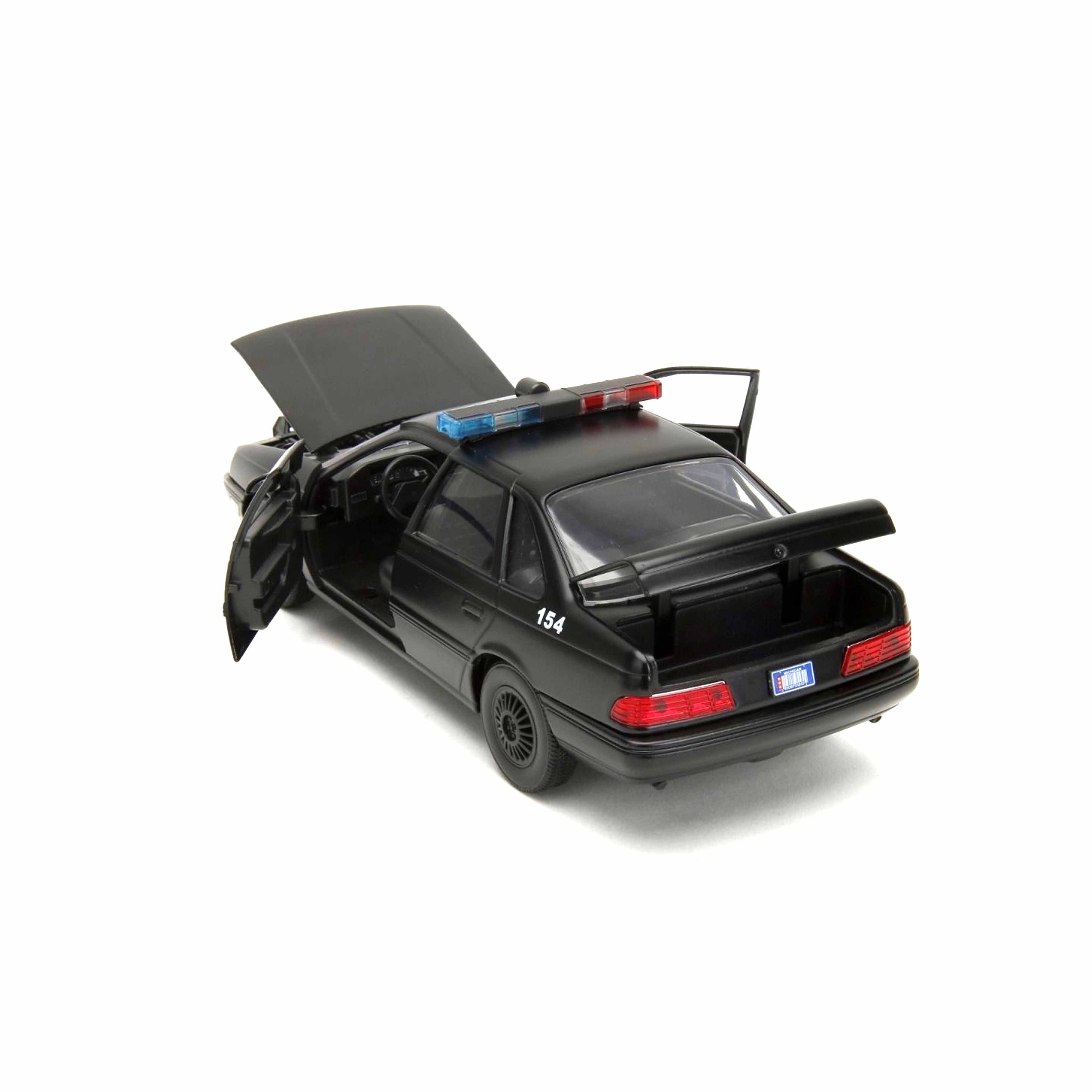 Ford Taurus Black with Robocop figure 1986 1:24