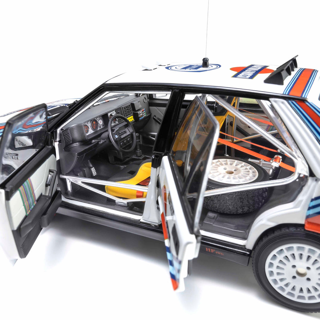 Lancia Delta HF 4WD 1987 Olympus Rally MARTINI ROSSI N°3 1/18