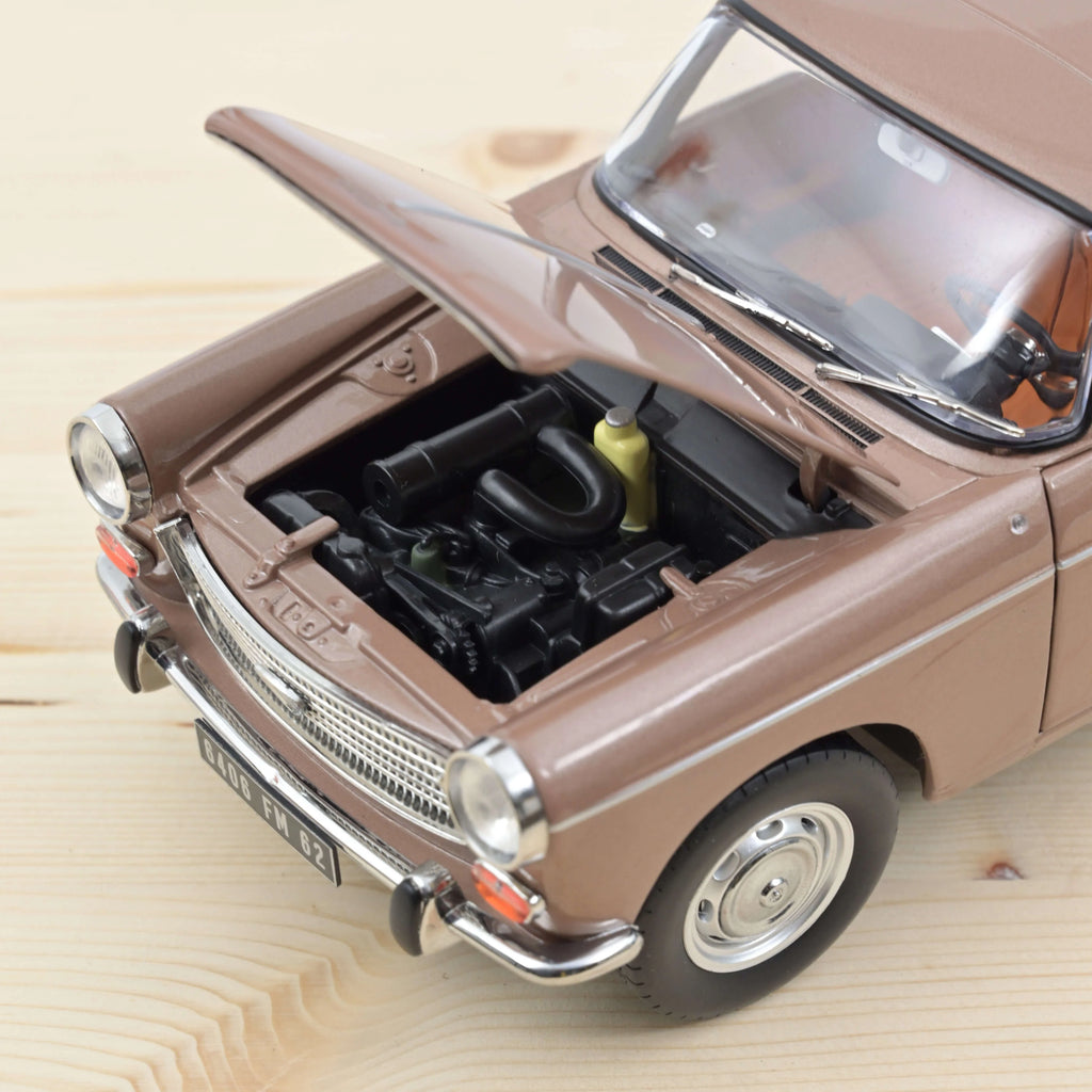 Peugeot 404 1965 Brun métallisé avec Caravane Hénon 1:18
