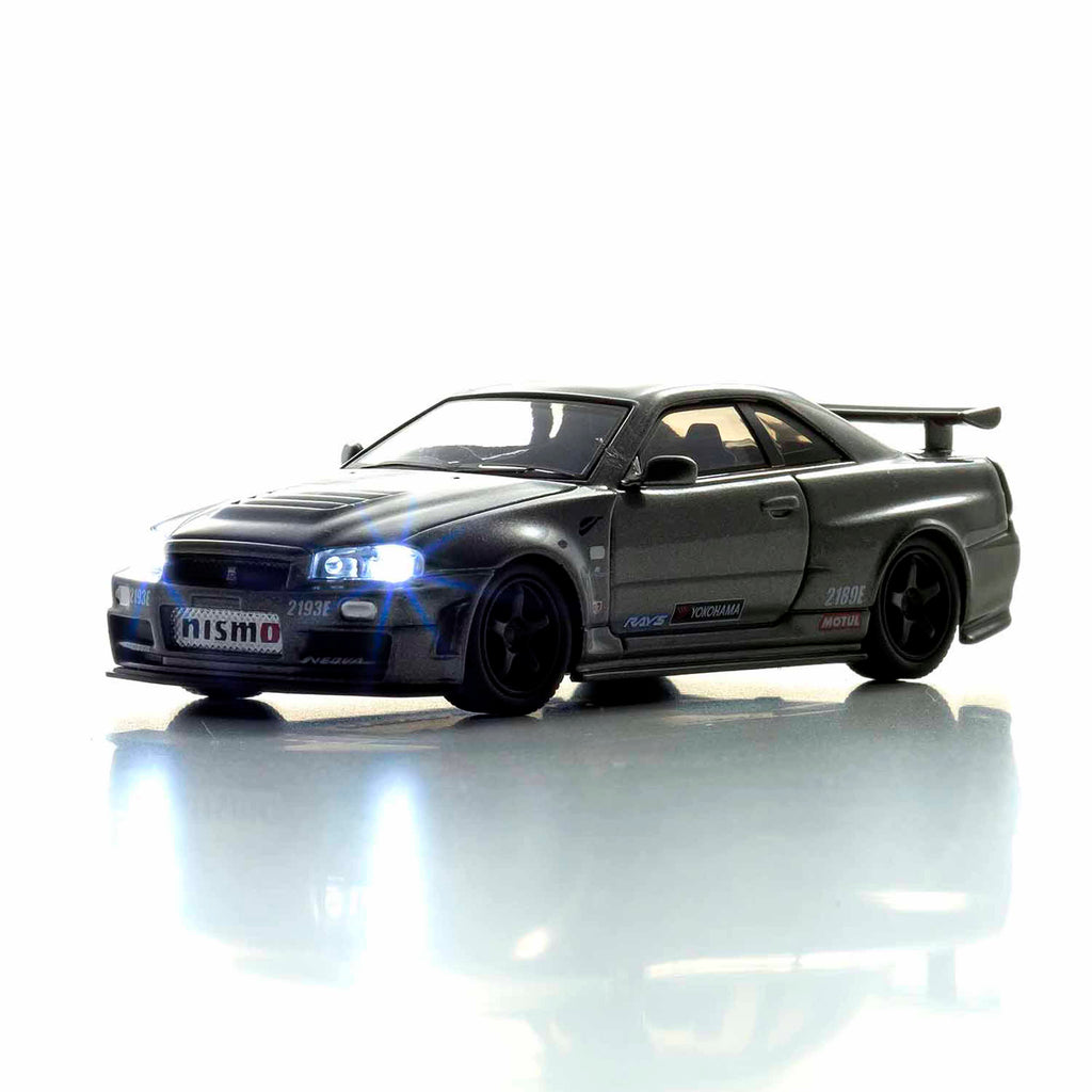 Nissan Skyline R34 GT-R NISMO (gris) 1/64