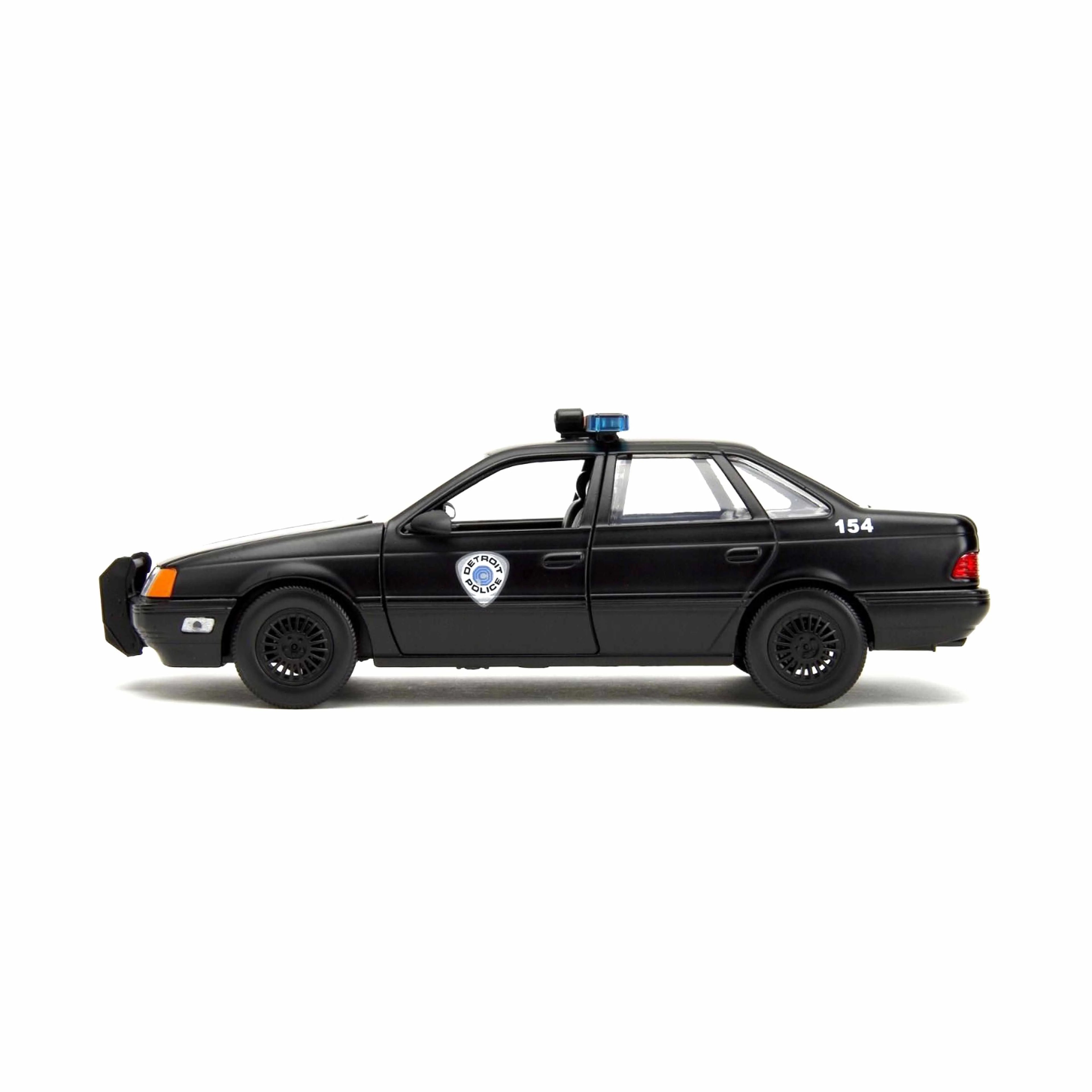 Ford Taurus Black with Robocop figure 1986 1:24
